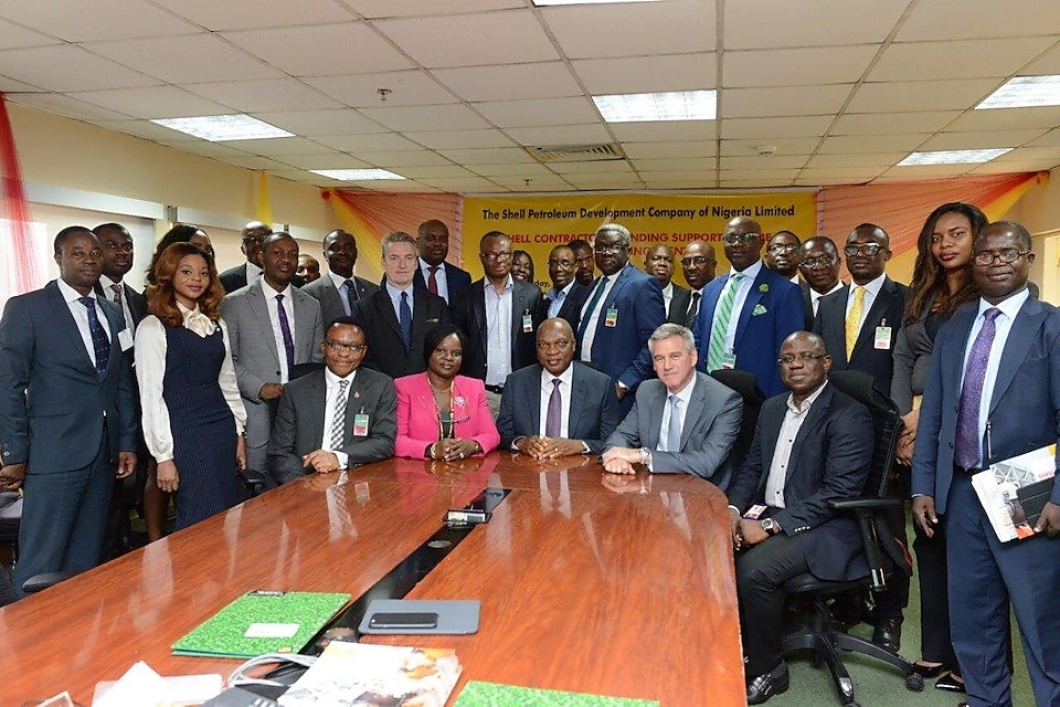 Sitting L-R: Petroleum Technology Association of Nigeria (PETAN) Chairman, Mazi Bank-Anthony Okoroafor; Rep. of the Group General Manager, National Petroleum Investment Management Services (NAPIMS), Supervisor, Community Development, Bunmi Lawson; MD, SPDC and Country Chair, Shell Companies in Nigeria (SCiN), Osagie Okunbor; Finance Manager, Nigeria and Gabon, Guy Janssens and MD, SNEPCo Bayo Ojulari with representatives of partner banks and contractors.