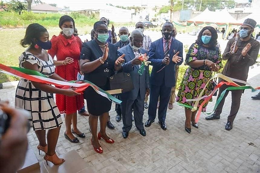 cutting the ribbon to the ict centre